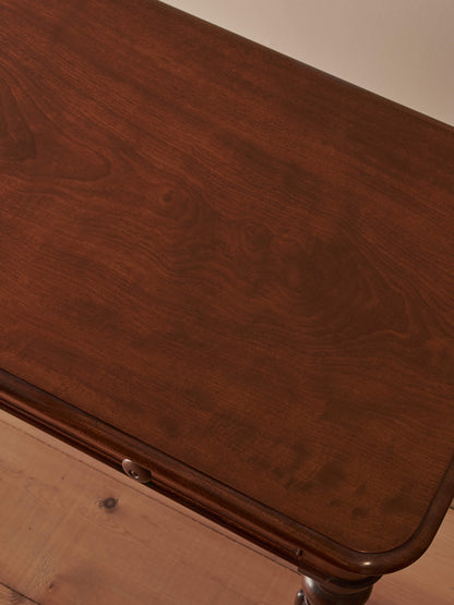 Early Victorian mahogany writing table with fluted legs