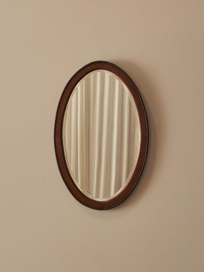 Edwardian oval oak bobbin mirror