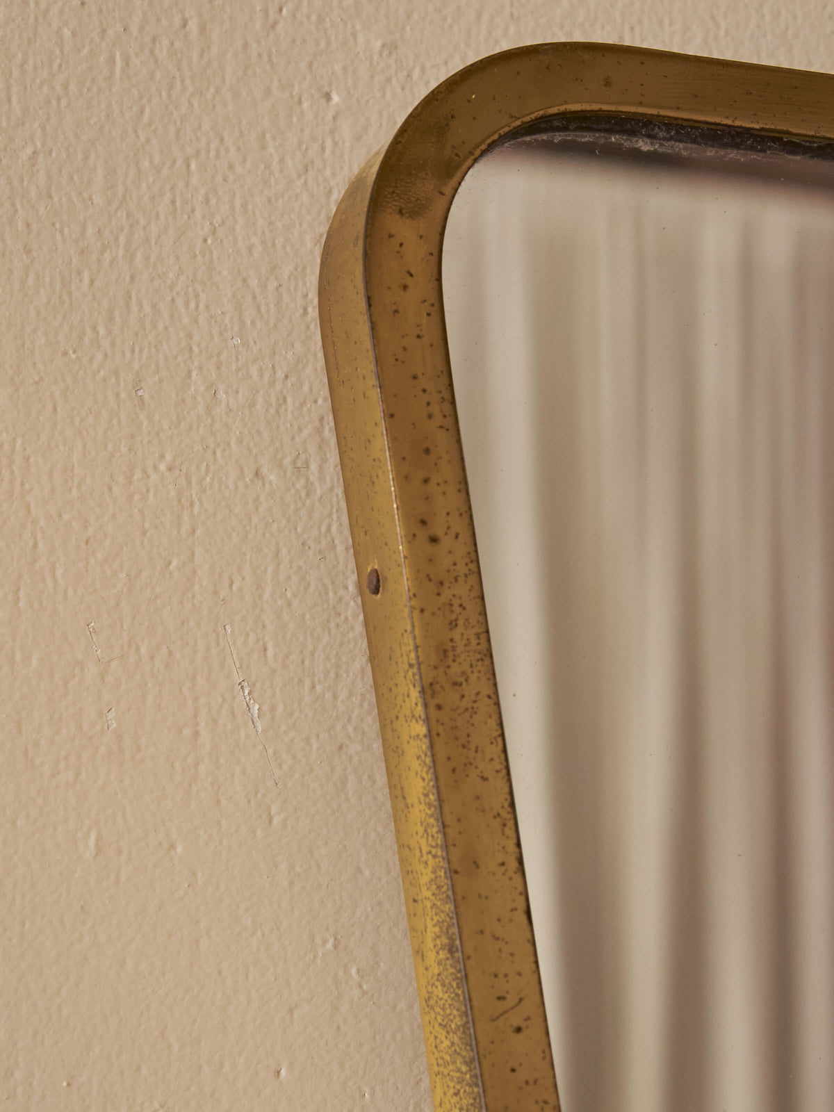 Mid-century Italian brass-framed mirror