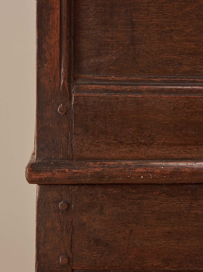 A George I oak chest of drawers on bun feet