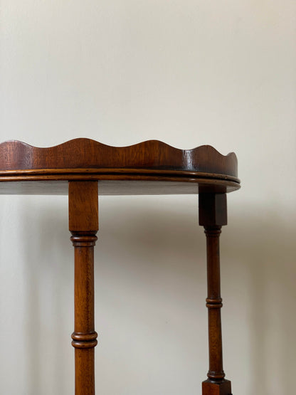 Antique two-tiered scalloped side table