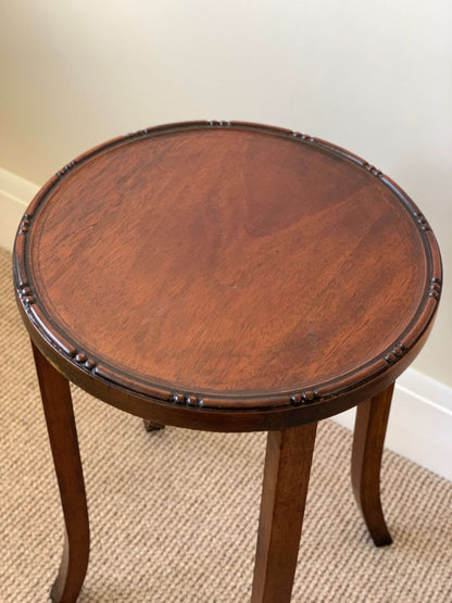 Vintage circular bobbin-beaded side table