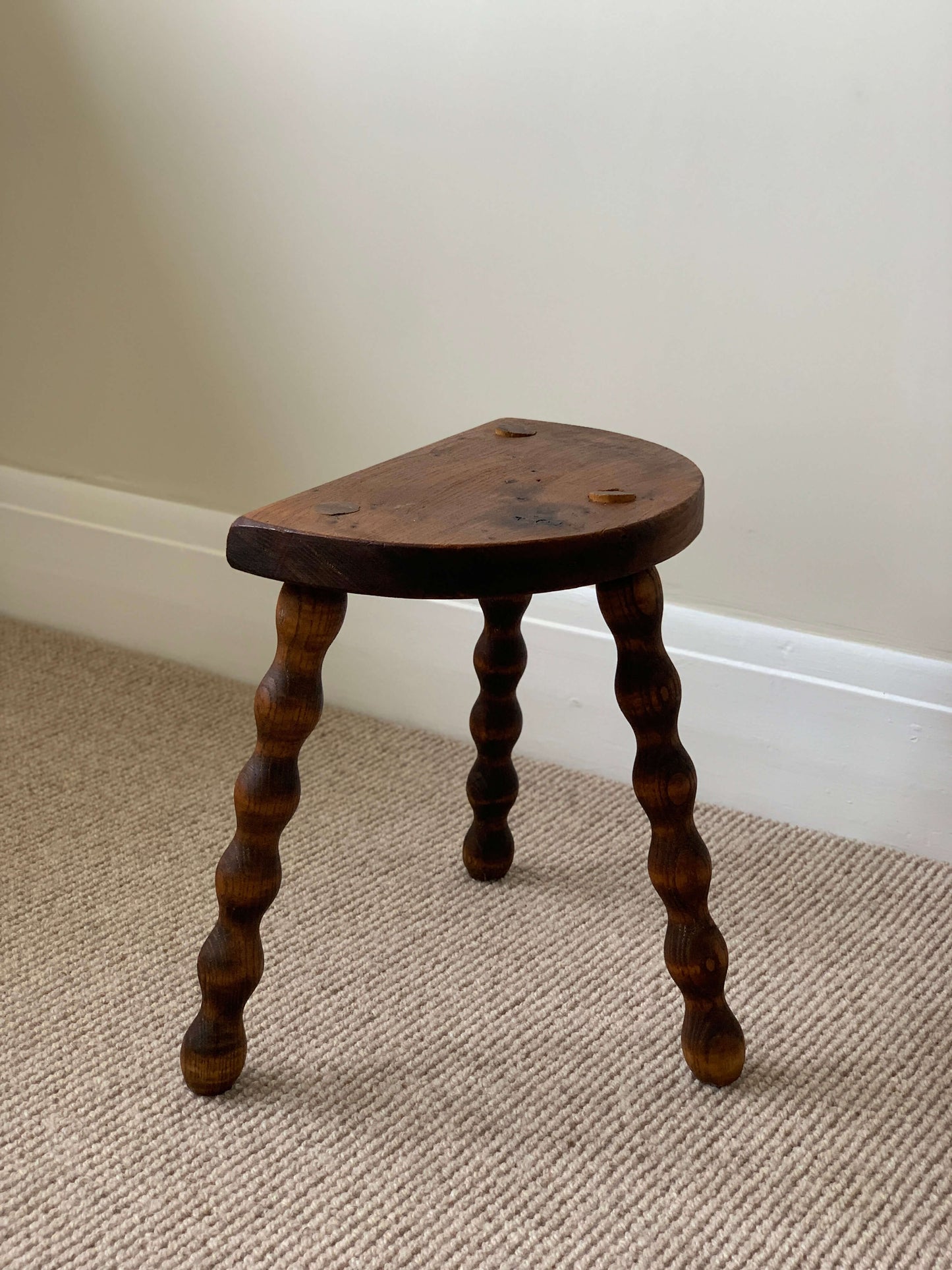 Short antique demilune bobbin stool