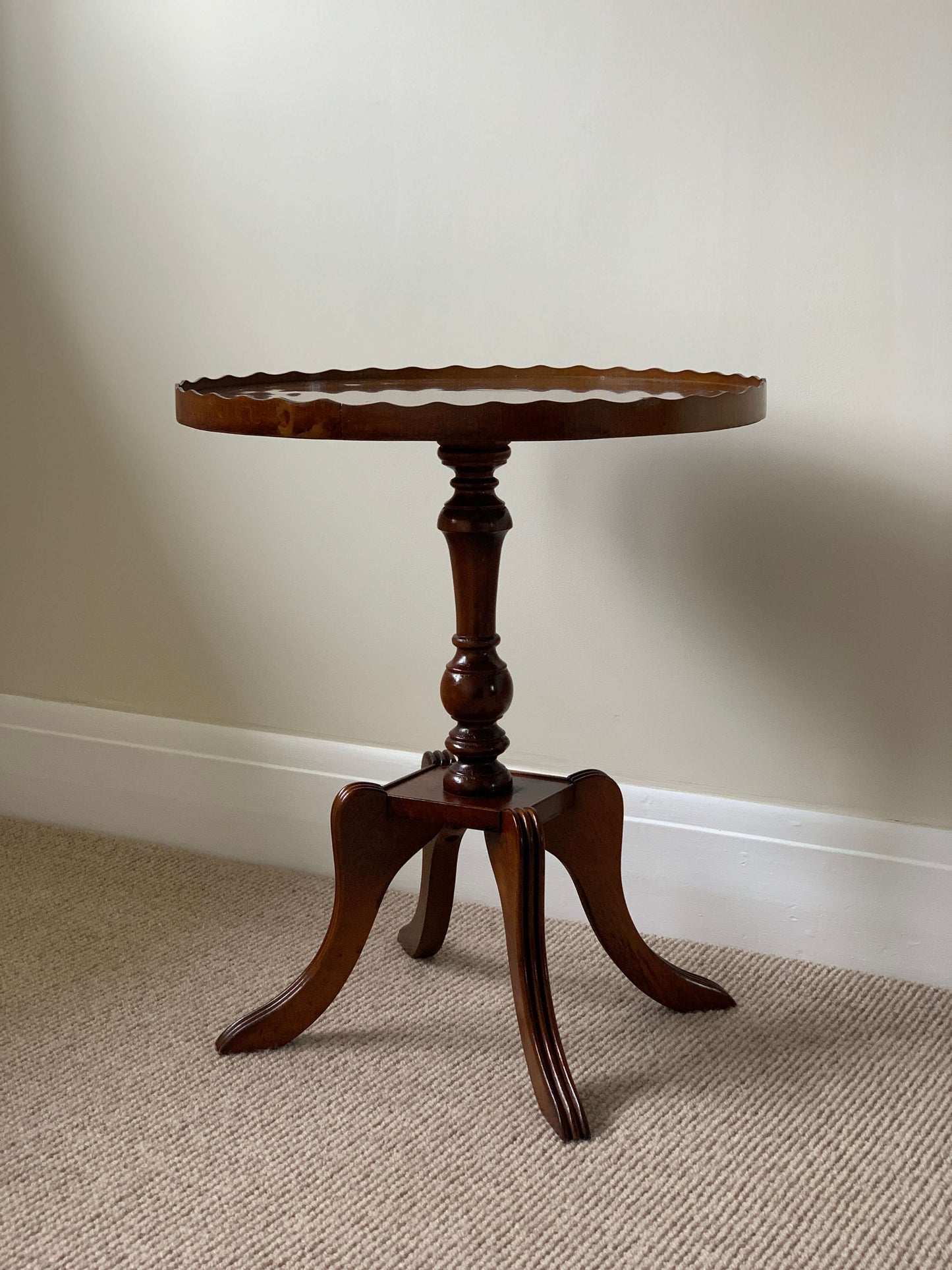 Vintage scallop-edged side table