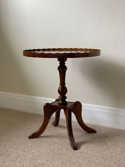 Vintage scallop-edged side table