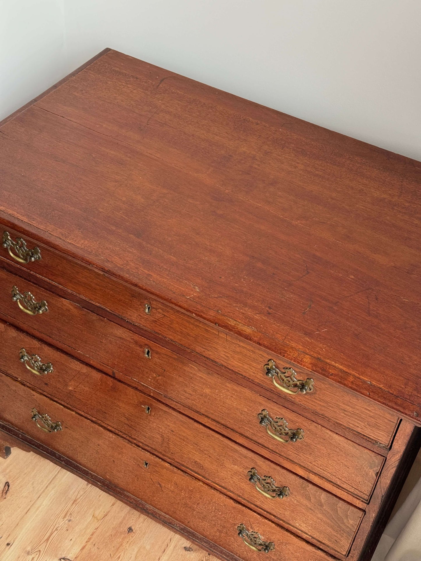 Georgian oak chest of drawers on bracket feet