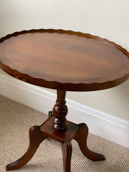 Vintage scallop-edged side table