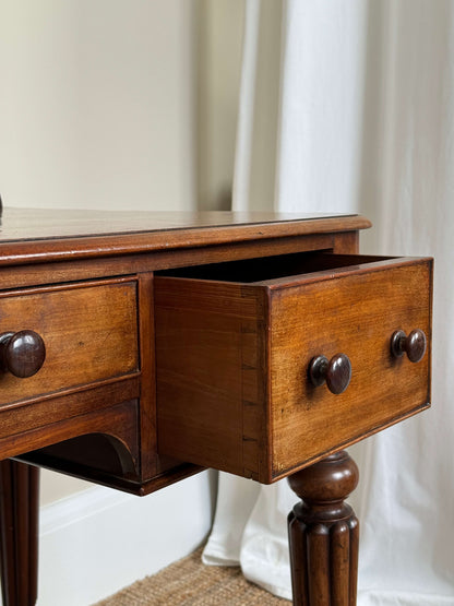 Victorian writing desk on brass castors