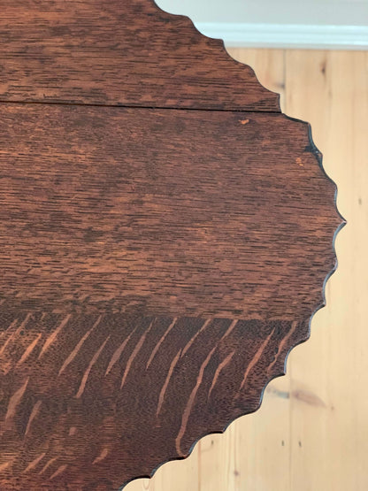 Antique oak table with scalloped edges and bobbin legs