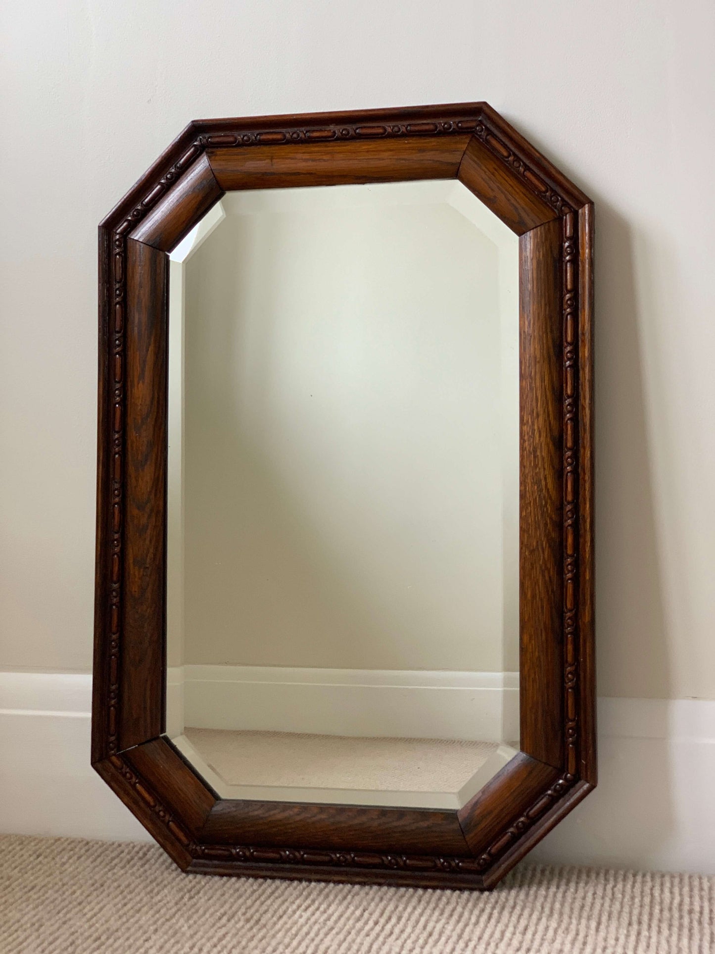 Antique oak octagonal bevelled mirror