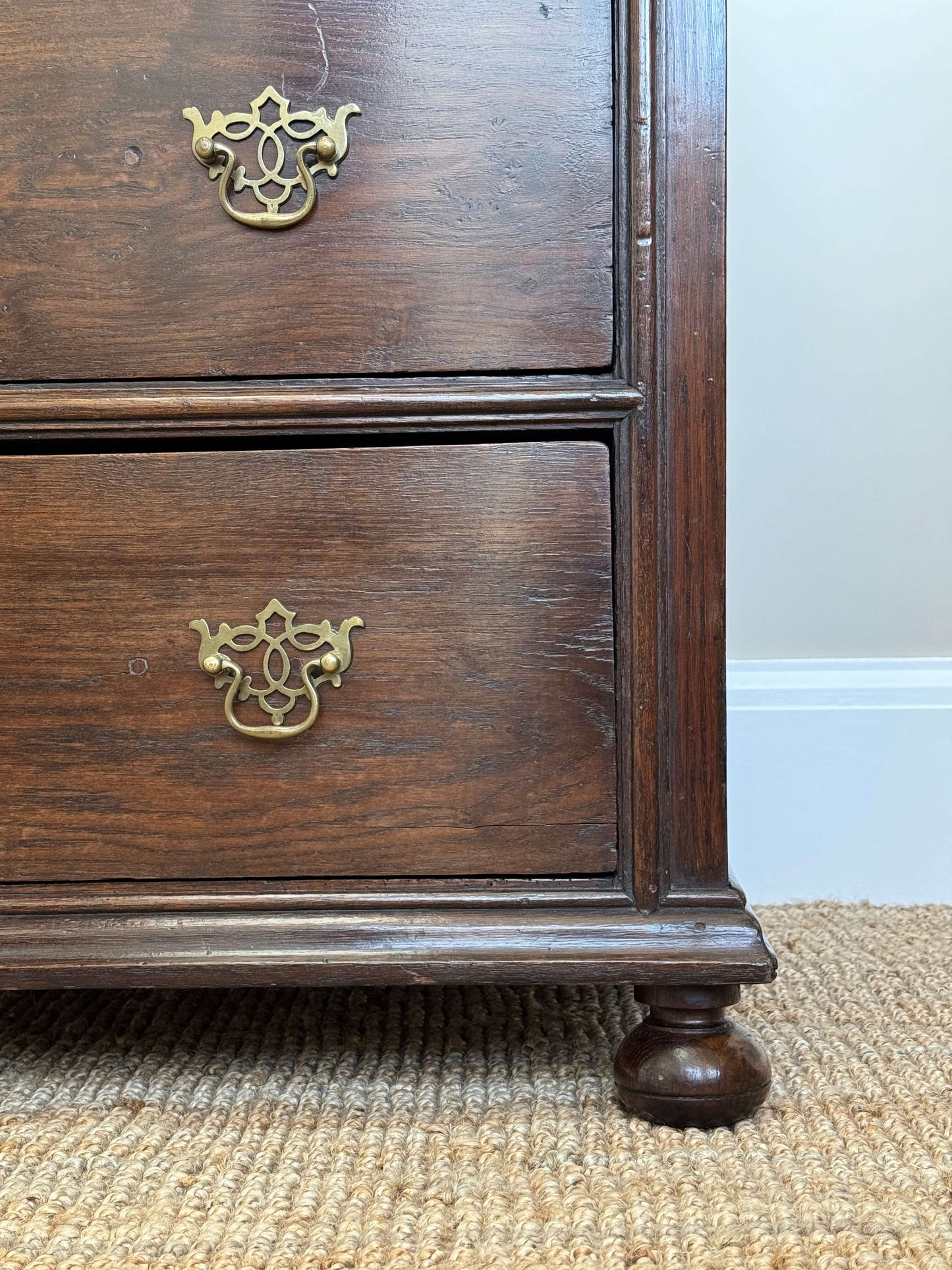 William and Mary oak chest of drawers on bun feet