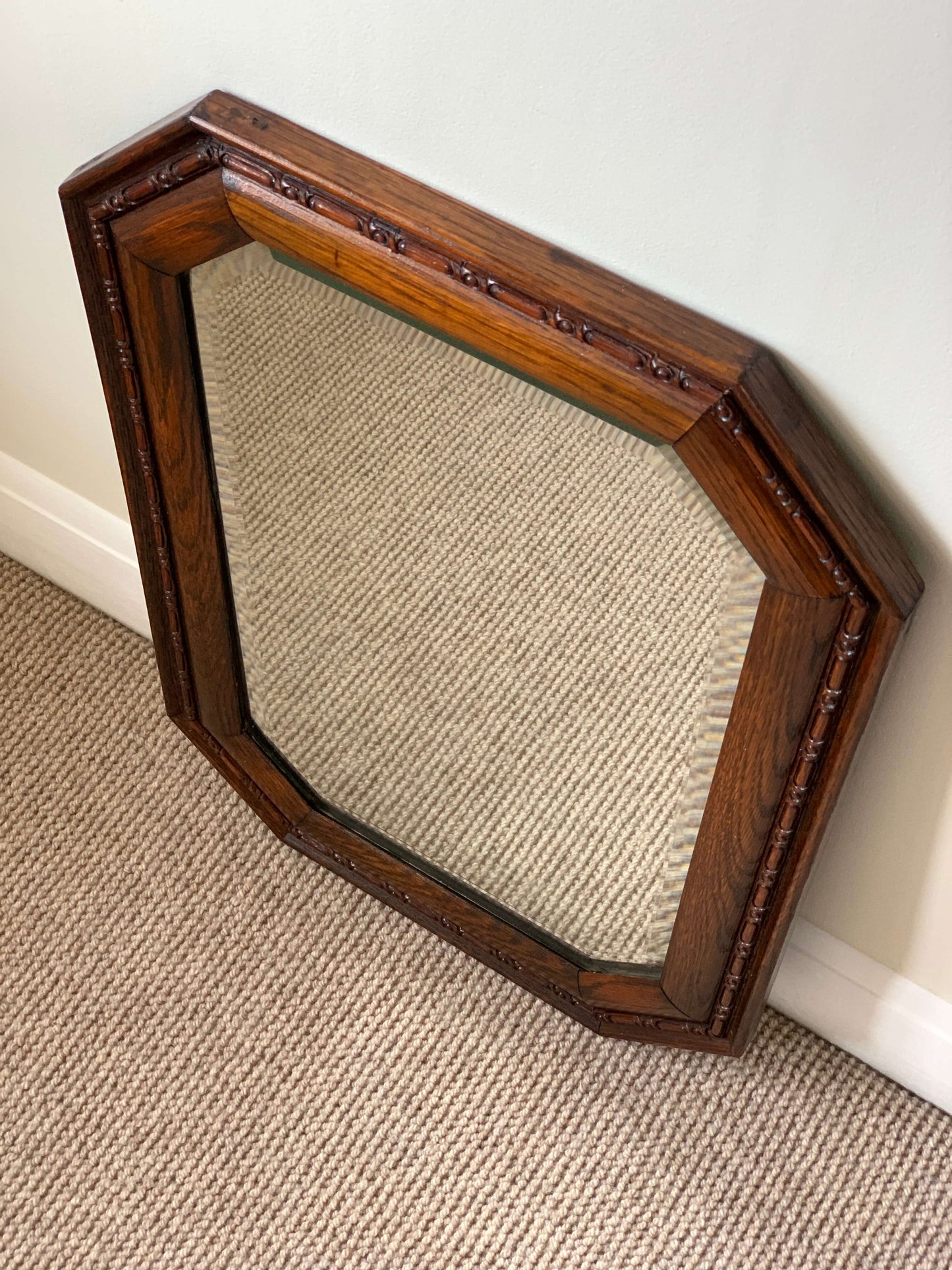 Antique oak octagonal bevelled mirror