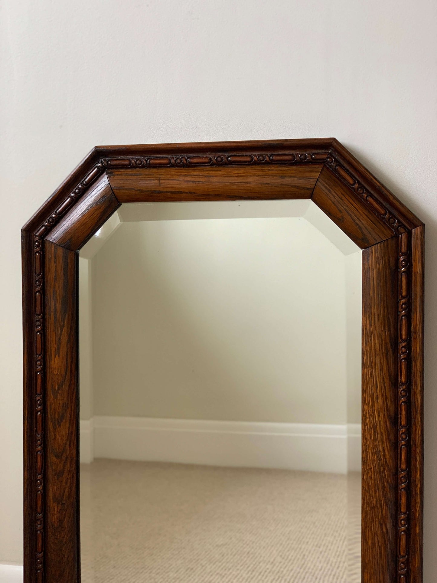 Antique oak octagonal bevelled mirror