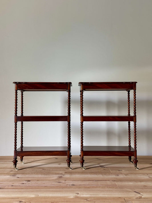 Pair of Victorian bobbin mahogany whatnots on castors