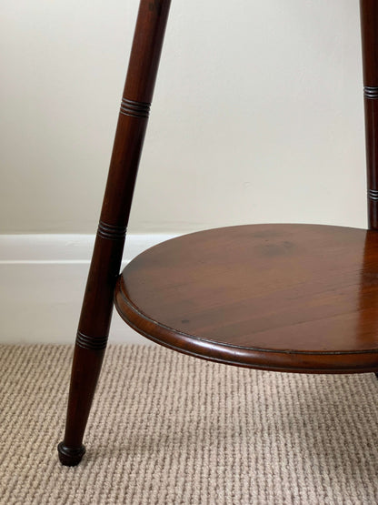 Circular antique cricket table with turned legs