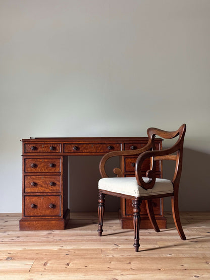 Regency mahogany fiddleback twin pedestal desk