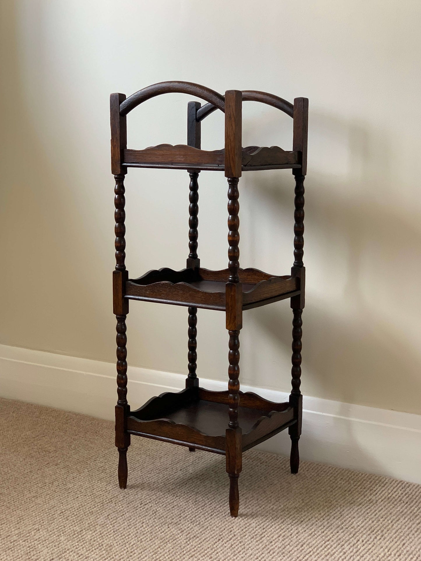 Antique bobbin three tiered shelving unit