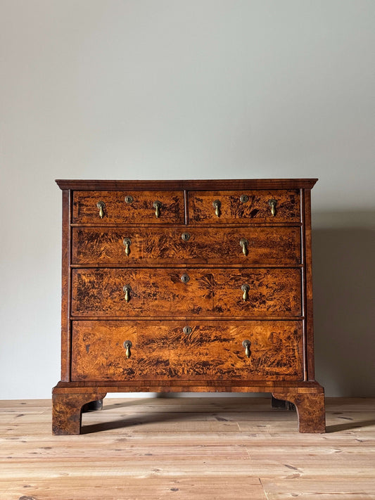George II walnut and elm crossbanded chest of drawers