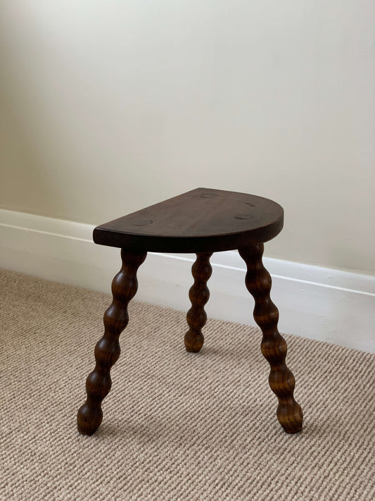 Short antique demilune bobbin stool