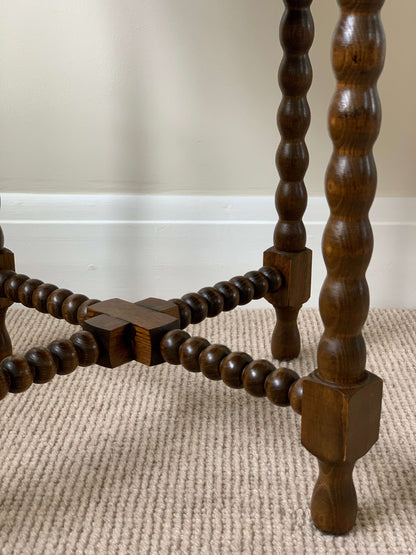 French antique circular bobbin side table