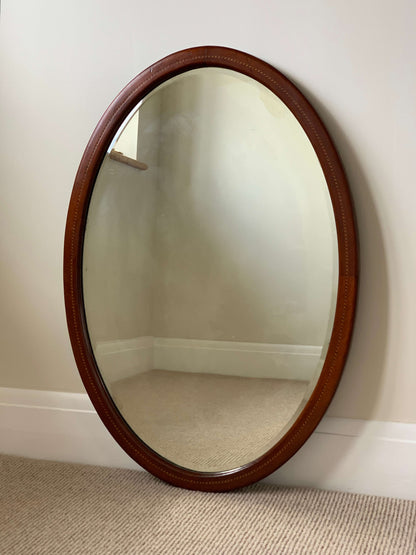 Antique oval mirror with marquetry detail