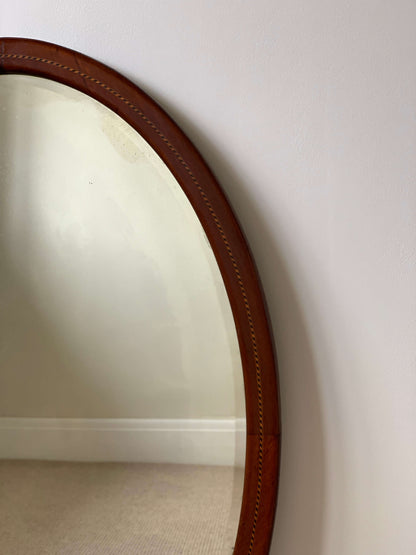 Antique oval mirror with marquetry detail