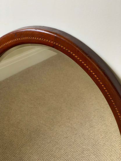 Antique oval mirror with marquetry detail