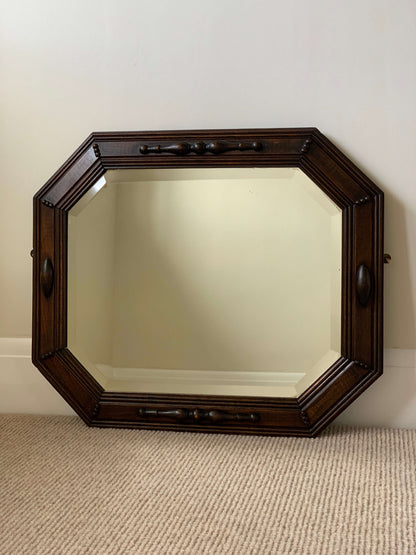 Antique octagonal bevelled mirror with beaded frame