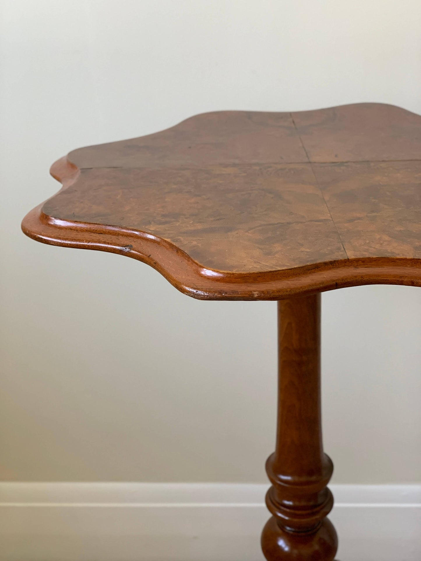 Early Victorian walnut table with scalloped top