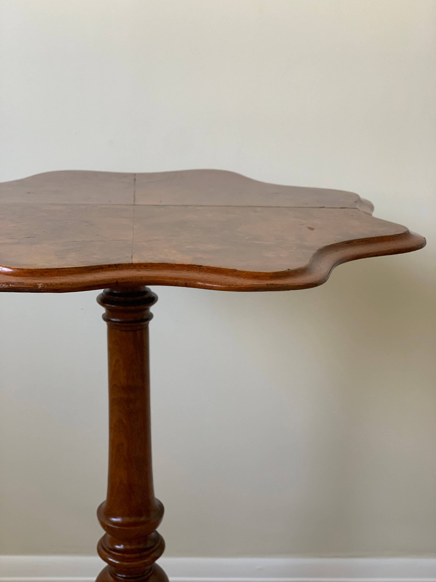 Early Victorian walnut table with scalloped top