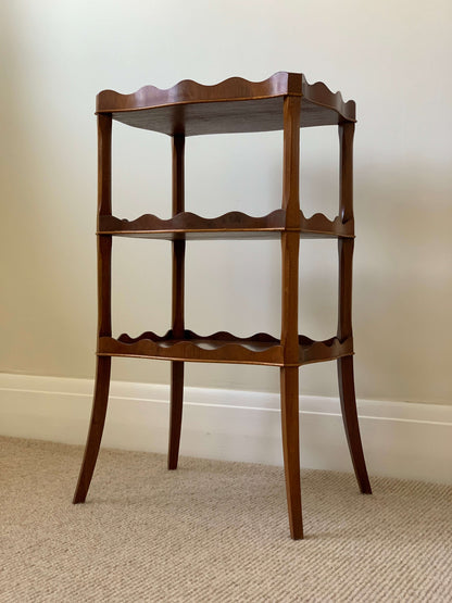 Antique three-tiered scalloped side table