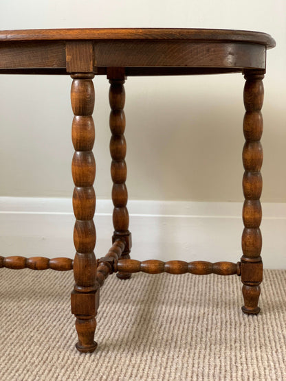 Blonde antique oval bobbin table