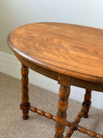 Blonde antique oval bobbin table