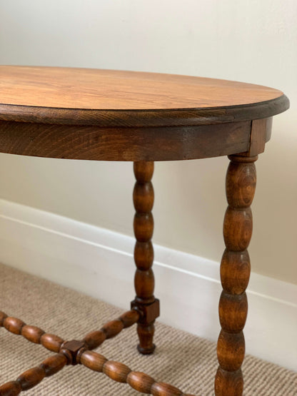 Blonde antique oval bobbin table