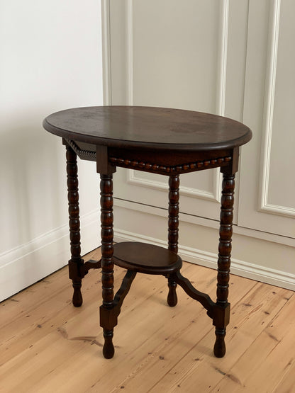 Antique oval bobbin side table