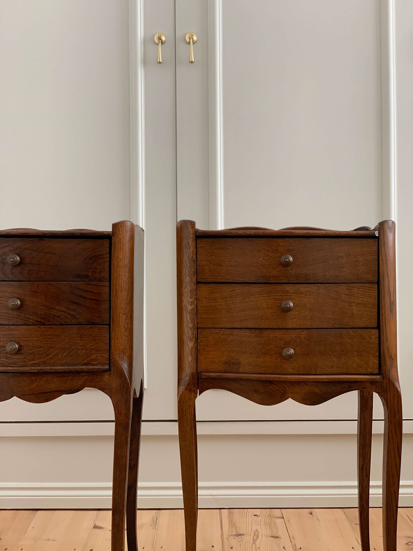 Pair of dark oak French vintage bedside tables