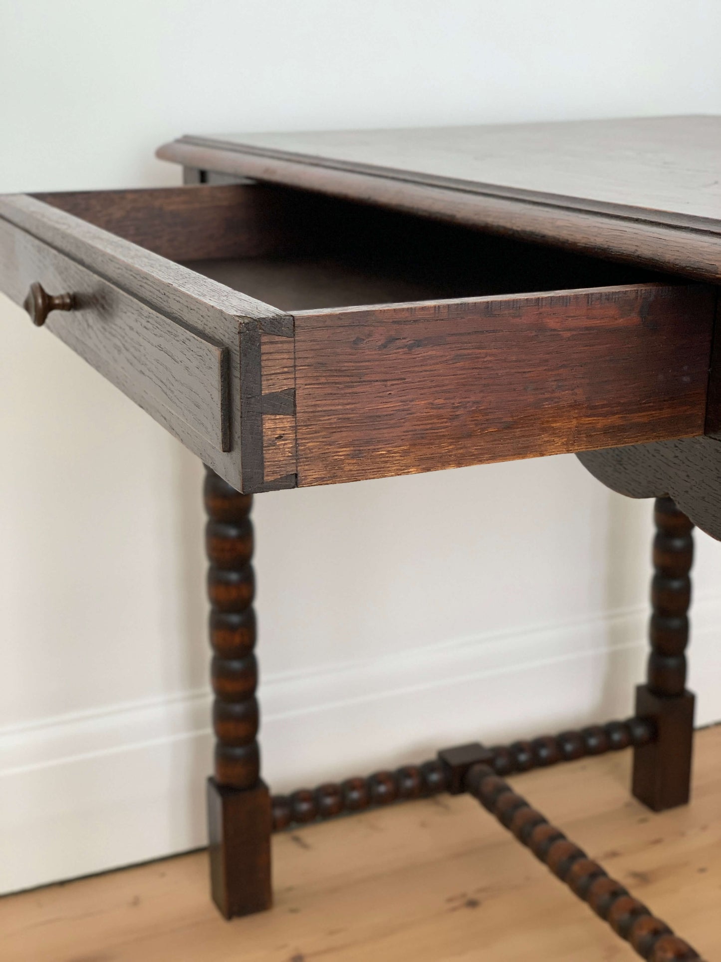 French antique oak scalloped bobbin console