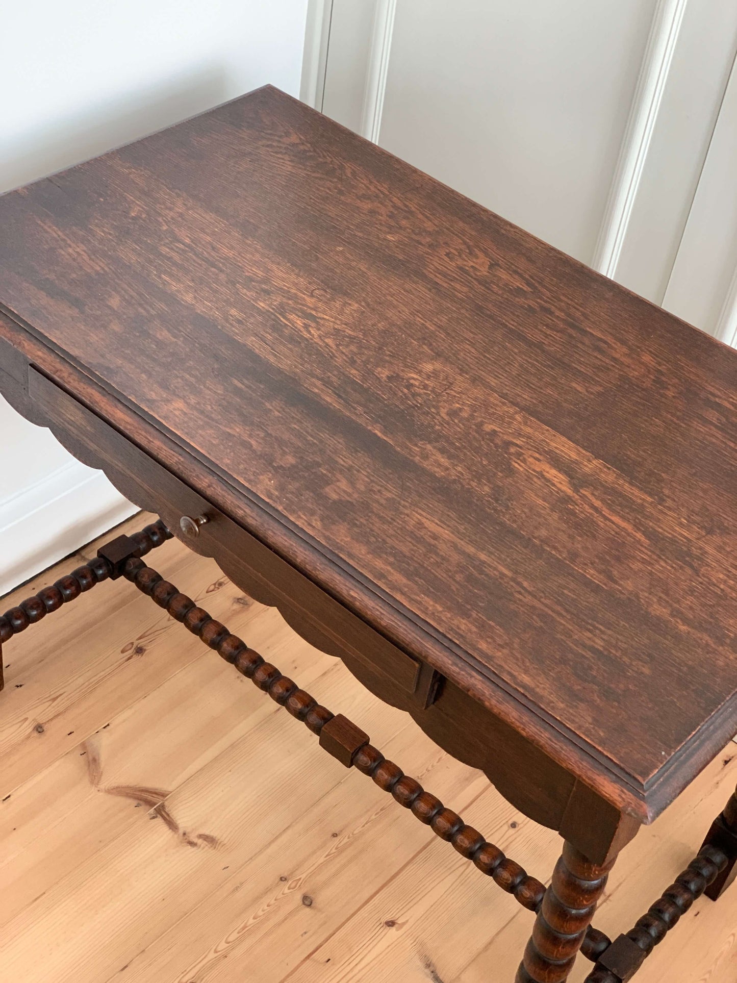 French antique oak scalloped bobbin console