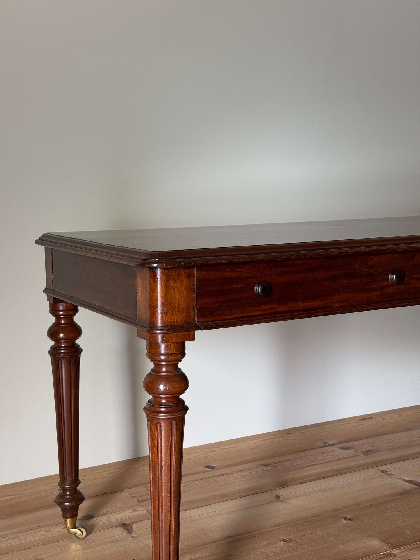 Victorian mahogany desk on brass castors