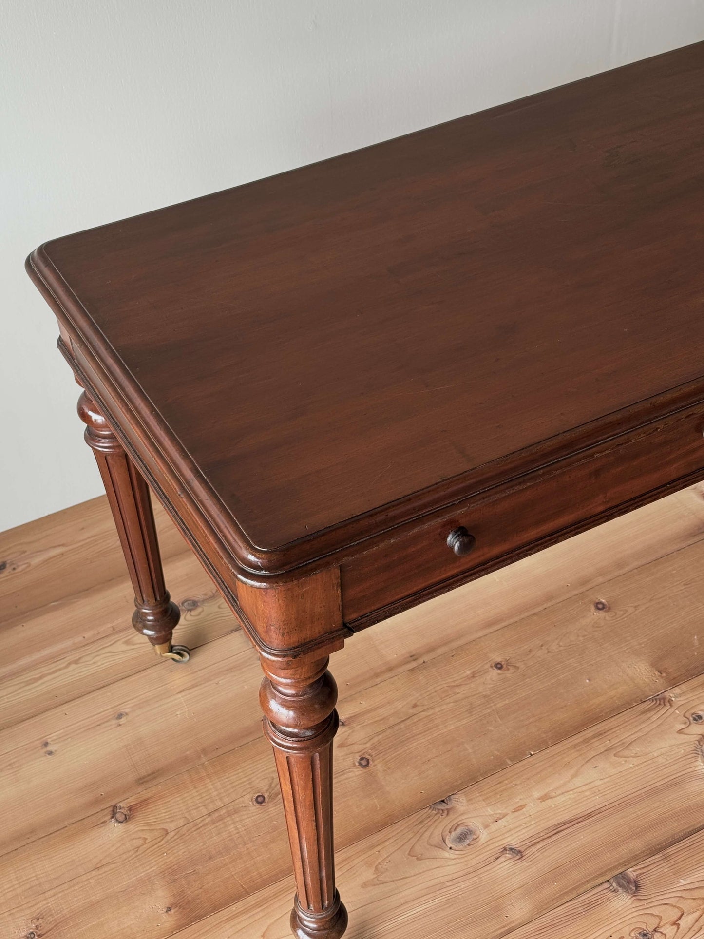 Victorian mahogany desk on brass castors