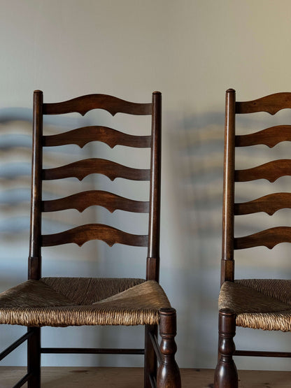 Set of four antique beech ladder back dining chairs