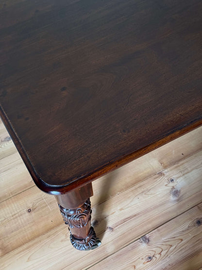 William IV mahogany dining table on brass castors