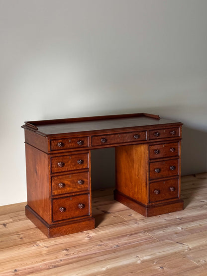 Regency mahogany fiddleback twin pedestal desk