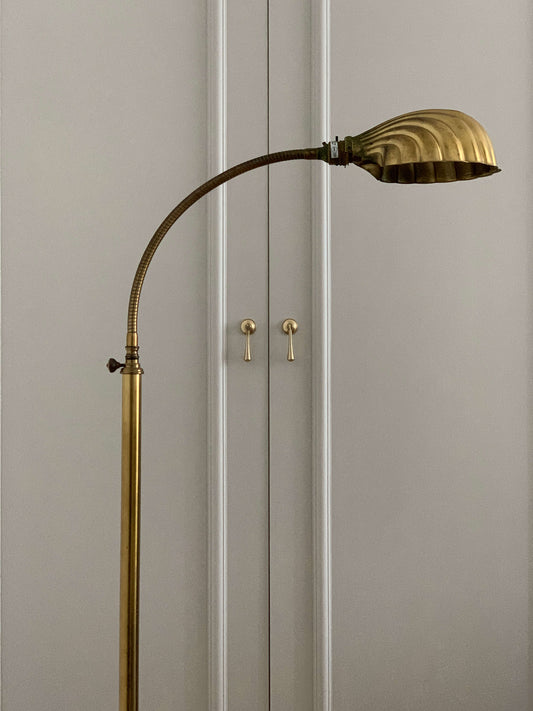 Vintage brass shell floor lamp by Christopher Wray