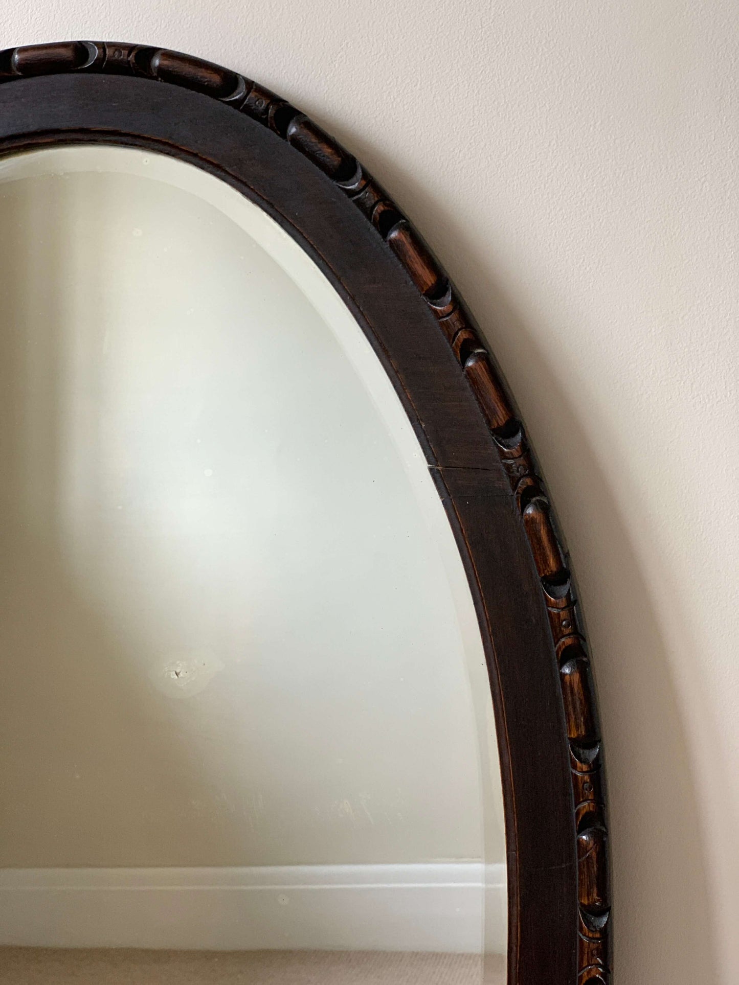 Victorian antique hand-carved oval mirror