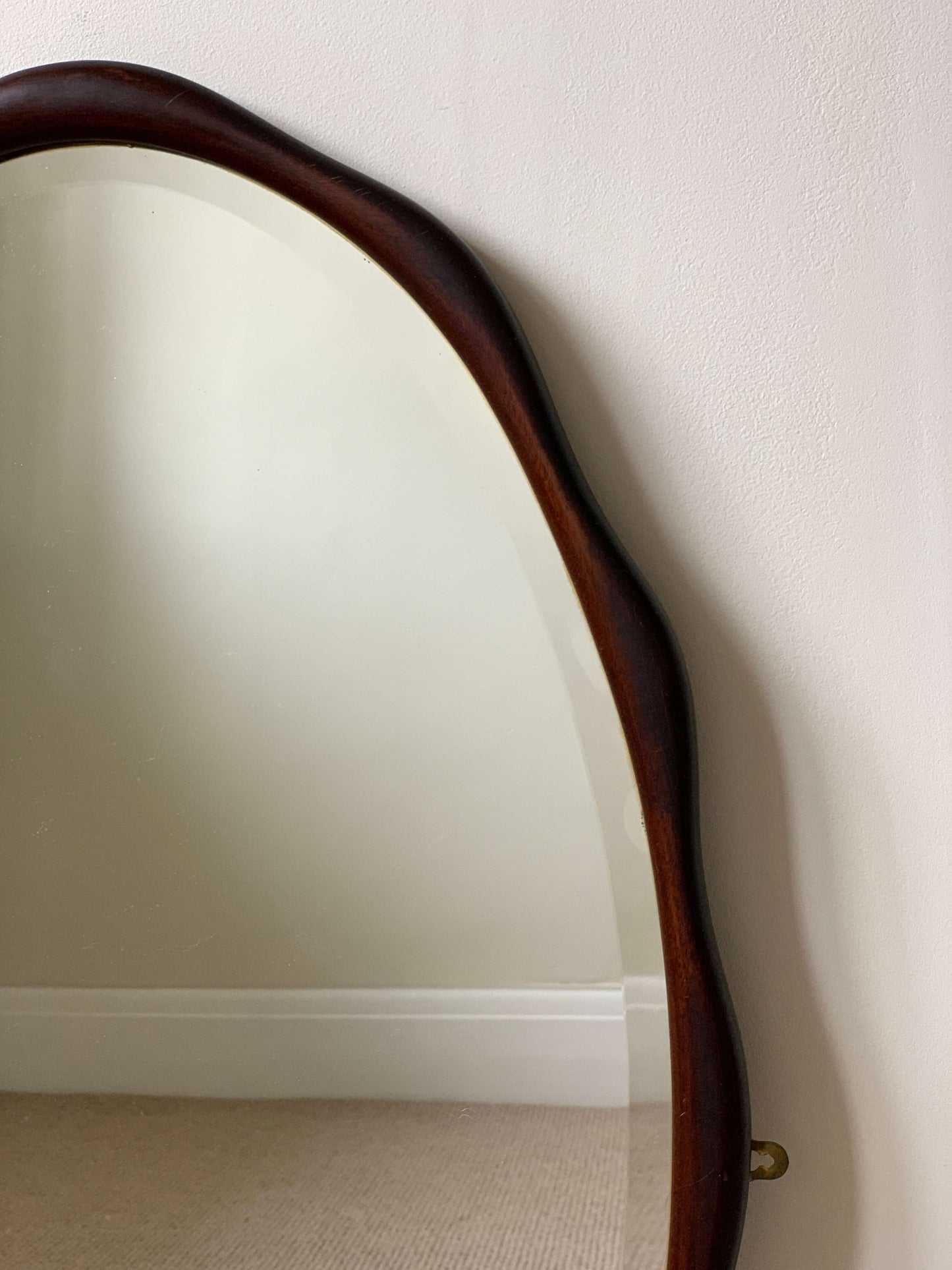 Antique mahogany scalloped mirror