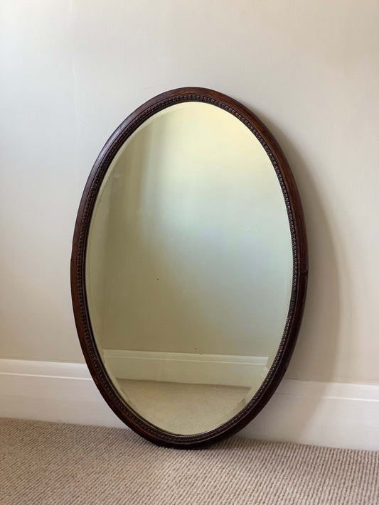 Antique late Victorian oval bevelled mirror