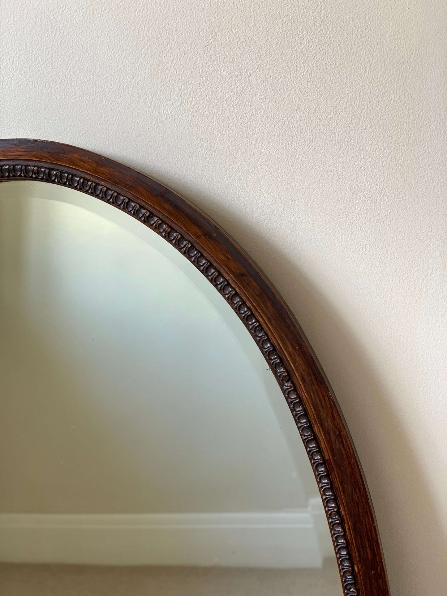 Antique late Victorian oval bevelled mirror