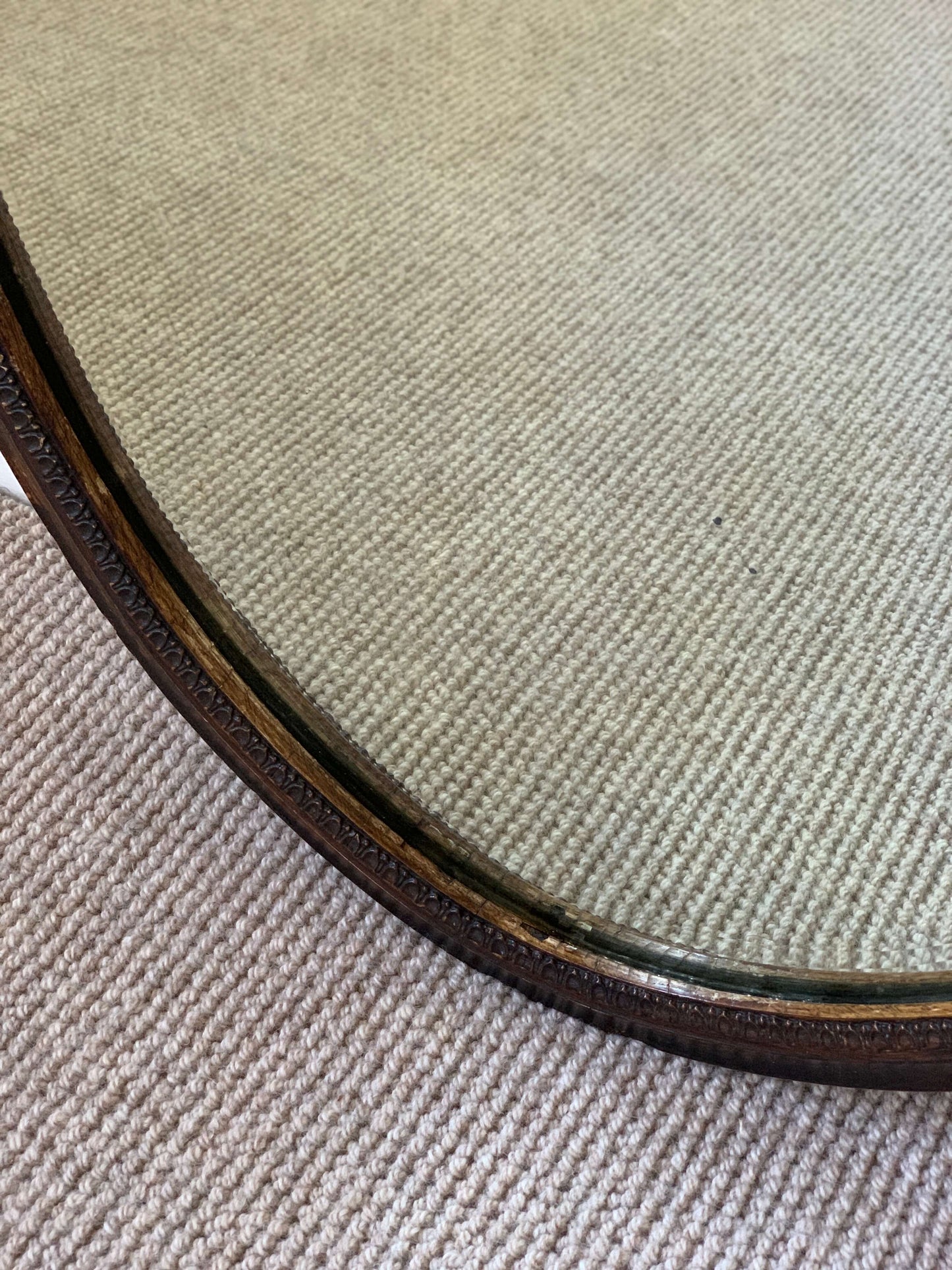 Antique late Victorian oval bevelled mirror