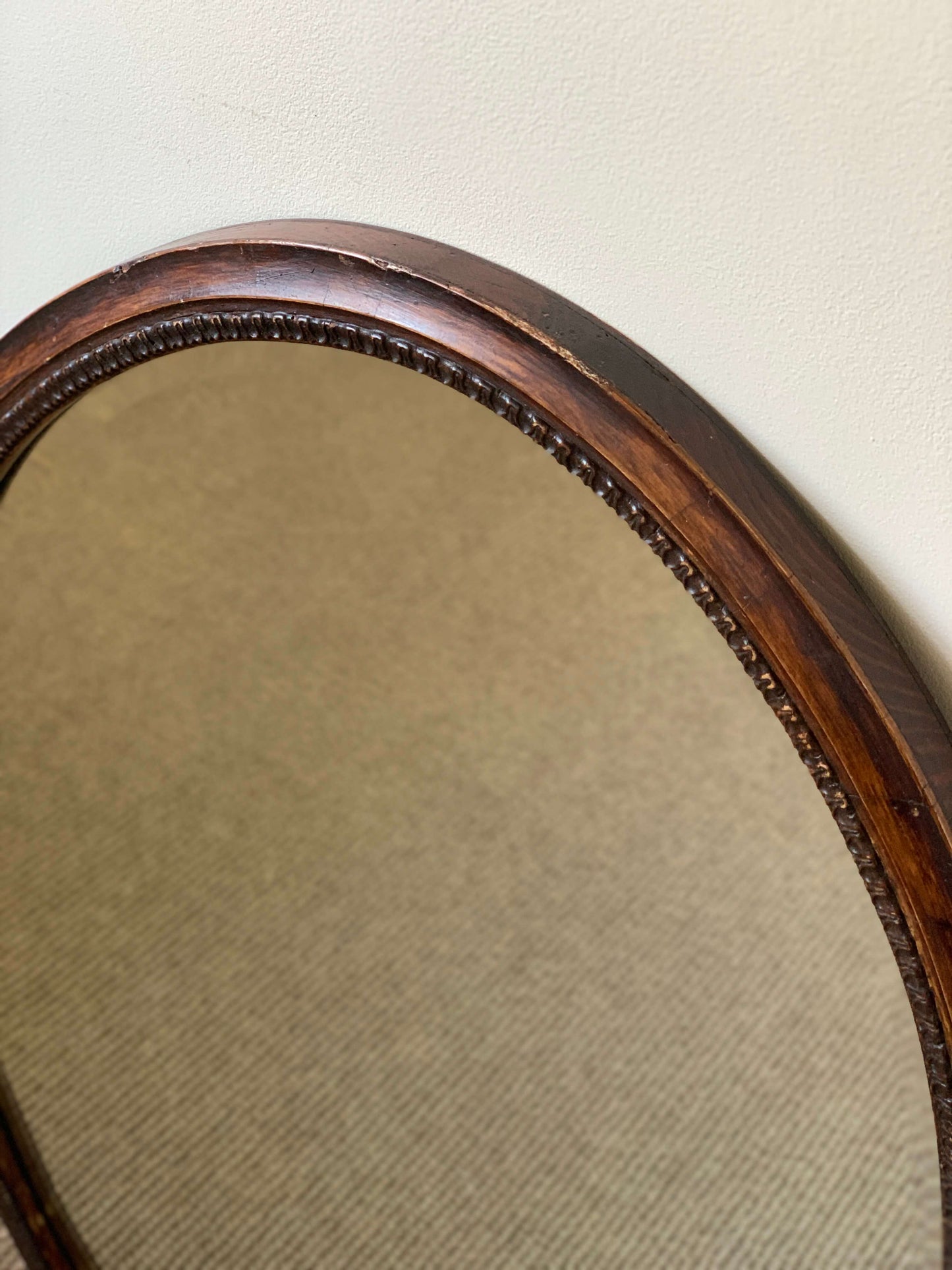 Antique late Victorian oval bevelled mirror